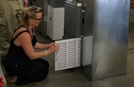 Capital heating & Cooling changing air filter